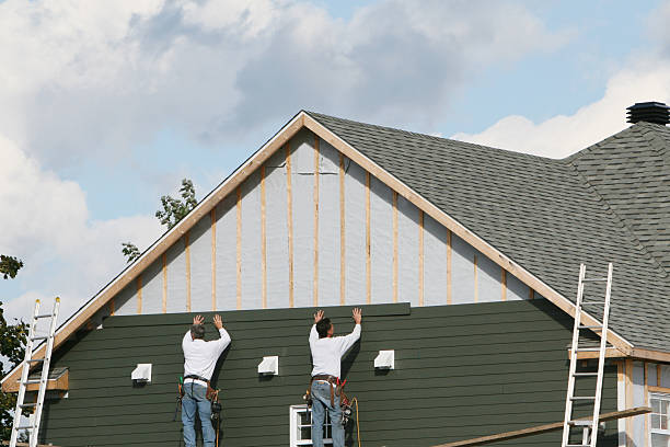 Professional Emergency Siding Repair technician working in Bloomington, IN